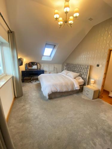 Voodi või voodid majutusasutuse House & hot tub in Torbay Devon Torquay toas