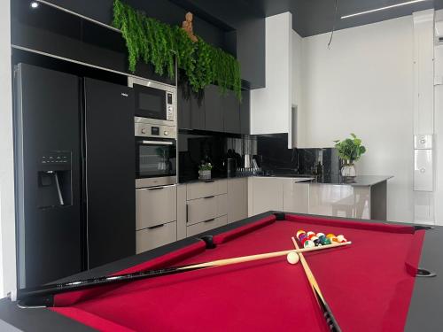 Kuchyň nebo kuchyňský kout v ubytování Chambre Selva en colocation