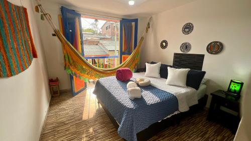 a bedroom with a bed with two towels on it at La Marteja in Salento