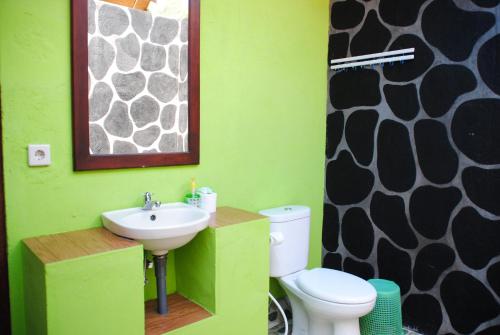 Vannituba majutusasutuses Kubu Sari Guest House
