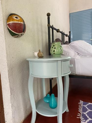 Ένα ή περισσότερα κρεβάτια σε δωμάτιο στο Casa na floresta na Chapada dos Veadeiros