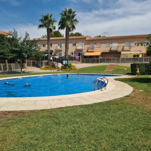 Foto Adosada, Piscina, Família y Vacaciones 4