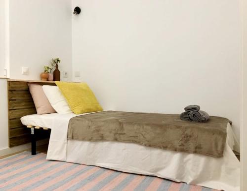 Ένα ή περισσότερα κρεβάτια σε δωμάτιο στο Hola Hostel Alicante