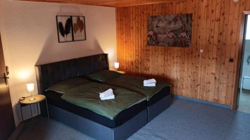 En eller flere senge i et værelse på BoardingHouse Neerstedt