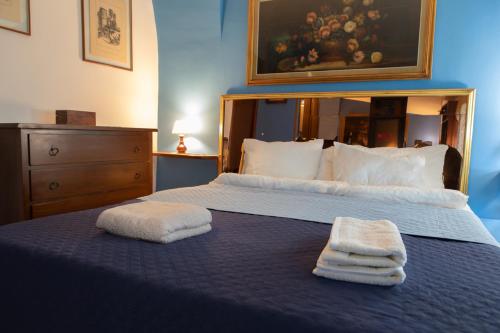 Katil atau katil-katil dalam bilik di Casa Vitelli - Centro Storico a due passi da tutto