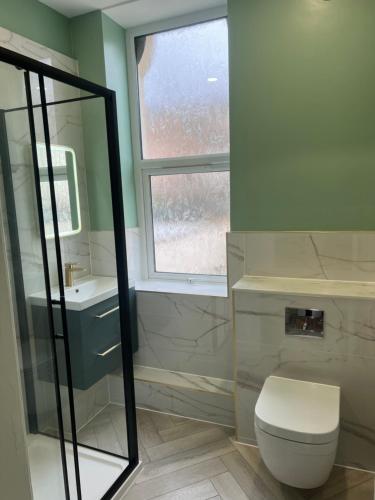 Et badeværelse på North Coast Boutique Apartment