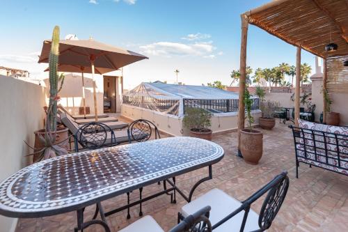 Un balcón o terraza en Riad Amalia