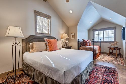 a bedroom with a large bed and a window at Serenity in the Valley in Jackson