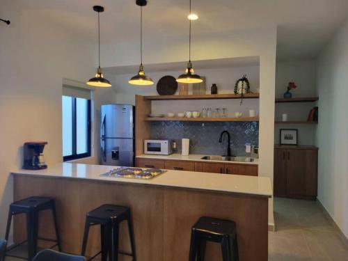 Η κουζίνα ή μικρή κουζίνα στο Cómodo departamento