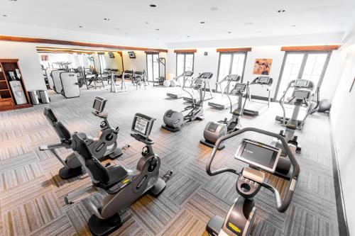 a gym with treadmills and elliptical machines at JW Marriott Guanacaste Resort & Spa in Tamarindo