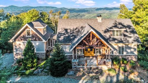 a home with a view of the mountains at Heaven's Peak in Banner Elk