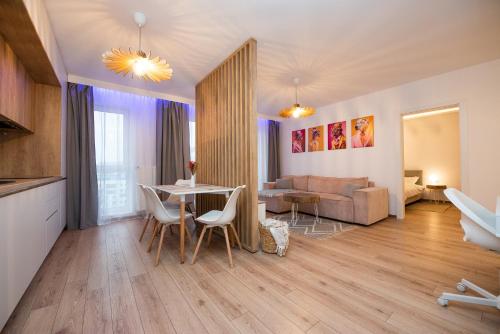 Ένα ή περισσότερα κρεβάτια σε δωμάτιο στο EGO Apartment