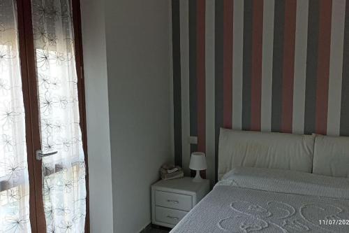 Ένα ή περισσότερα κρεβάτια σε δωμάτιο στο Turin Little House