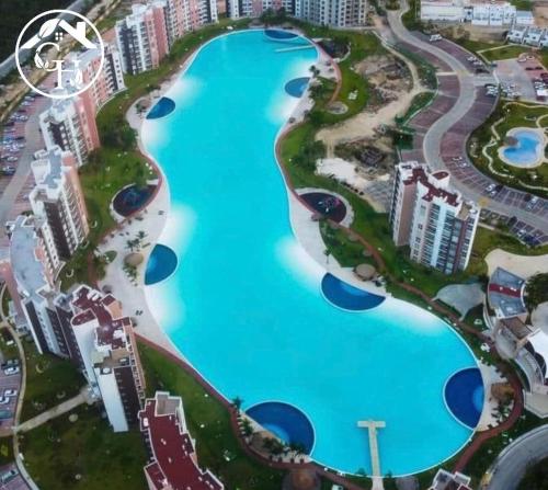 arial view of a large swimming pool in a city at Porteño Abode in Veracruz