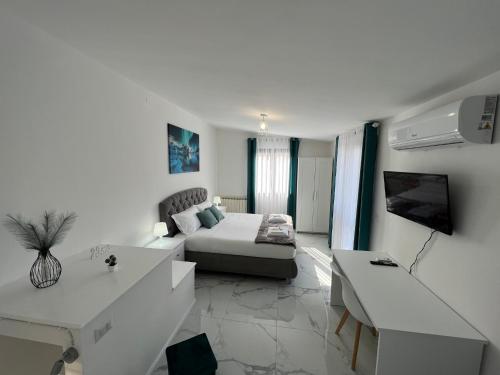 TV a/nebo společenská místnost v ubytování Casa Rodella -SUITE- San Sisto Perugia