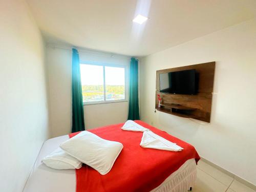 Cama ou camas em um quarto em Apartamento até 8 Pessoas Praia Grande - Le Bon Vivant