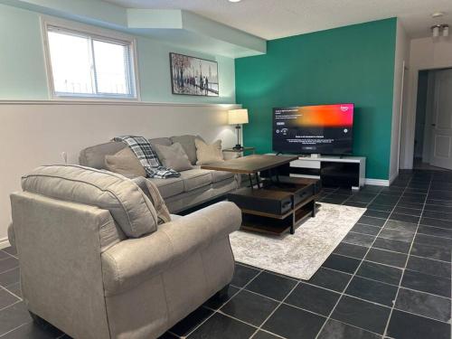 Μια τηλεόραση ή/και κέντρο ψυχαγωγίας στο Luxury Spacious 5-Bedroom Home