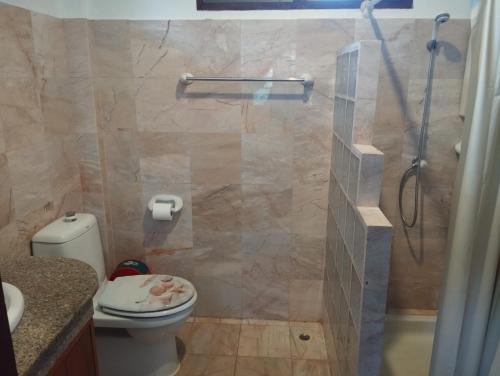 a bathroom with a shower with a toilet and a sink at Luxury front sea private villa, 3 bedroom on the bang po beach Maenam ,ko Samui in Ban Bang Po
