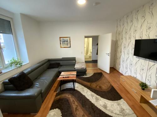 TV a/nebo společenská místnost v ubytování Apartment bei Michael Bochum