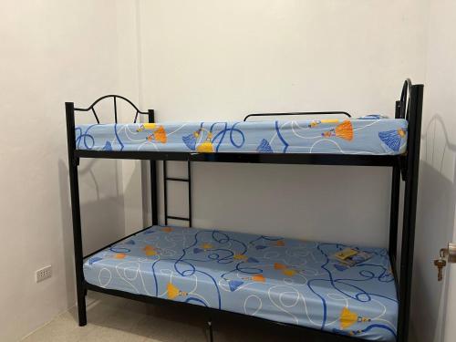 Двуетажно легло или двуетажни легла в стая в Caishen Modern Affordable Apartelle 202