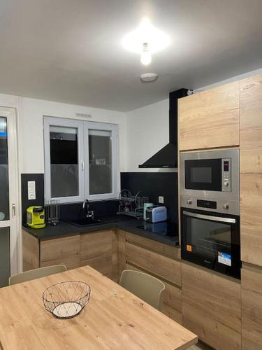 Kuchyň nebo kuchyňský kout v ubytování Les Cèdres