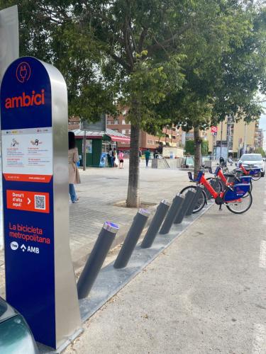 a row of bikes parked next to a street at BADAROSA House10min to BARCELONA City&NearTo BEACH in Badalona