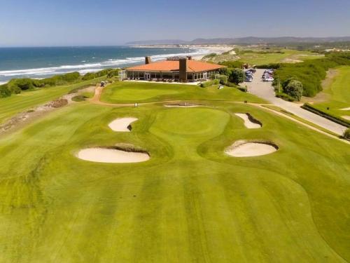 an overhead view of a golf course with the ocean at Hotel Contriz in Póvoa de Varzim