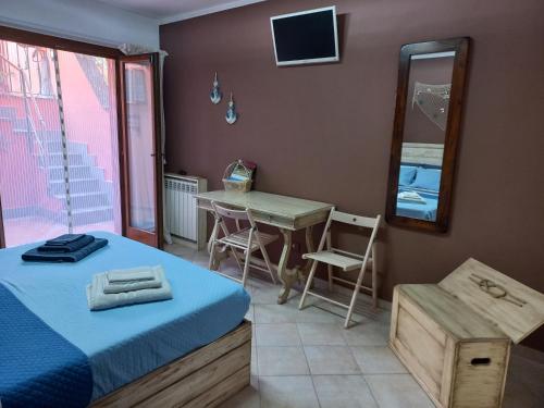 Postel nebo postele na pokoji v ubytování Guest room ‘’Sottocoperta’’