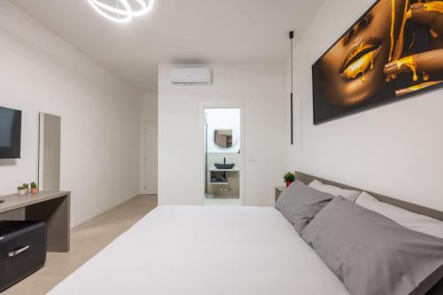 Postel nebo postele na pokoji v ubytování Luxury Station Suite