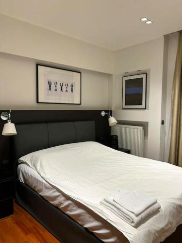 Postel nebo postele na pokoji v ubytování the ONE