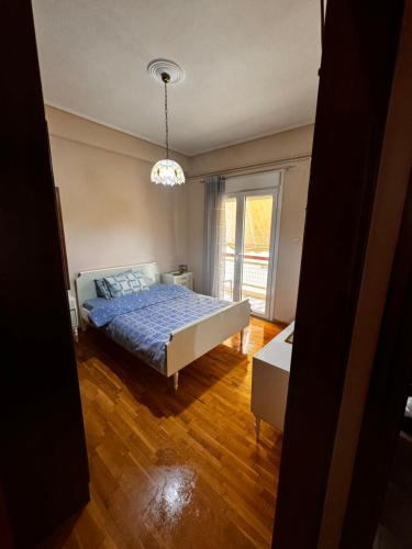 Postel nebo postele na pokoji v ubytování 100 square metres Trikala apartment half an hour from Meteora