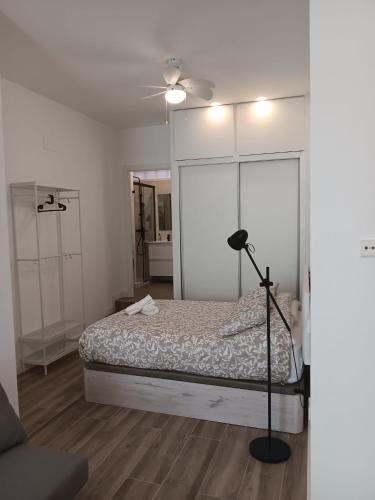 Кровать или кровати в номере Plaza de Castilla2 Apartments2