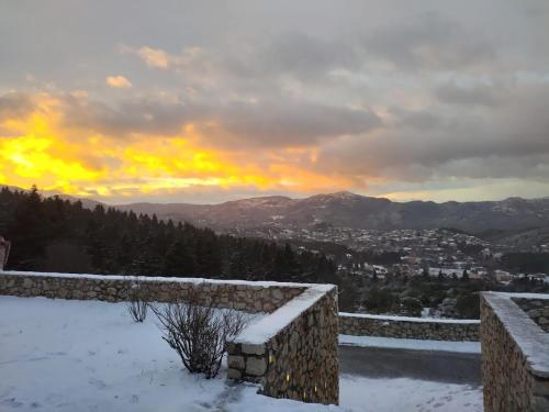 a view of a city in the snow at Αέσκω in Vytina