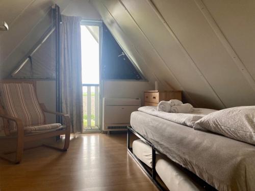 Postel nebo postele na pokoji v ubytování Horizon 5 pers holiday home nice view close to the National Park Lauwersmeer