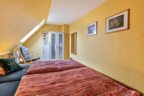 Ένα ή περισσότερα κρεβάτια σε δωμάτιο στο Utspann