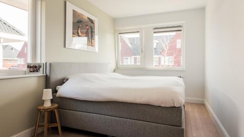 En eller flere senge i et værelse på Casa Jill