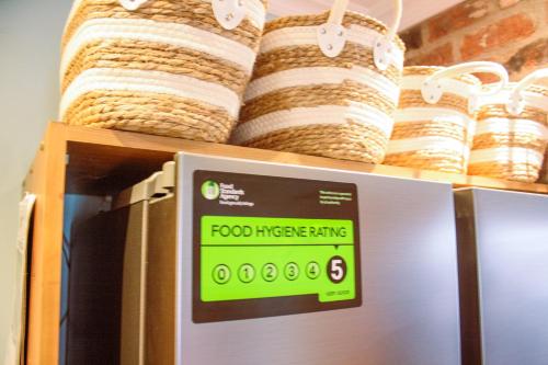 a food intercepting machine on a shelf with baskets at The Coach Inn in Strabane