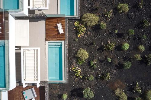 an overhead view of a building with plants on it at Royal Hideaway Corales Suites in Adeje