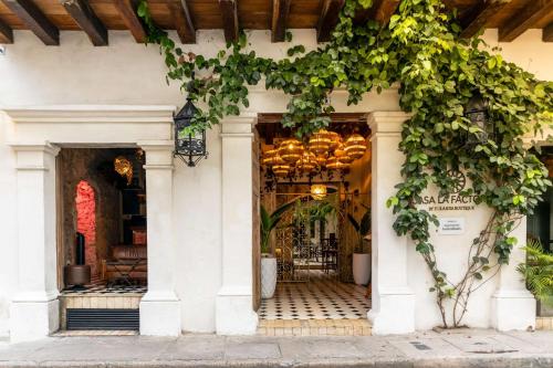 an entrance to a store with a building at Hotel Casa La Factoria by Faranda Boutique, a member of Radisson Individuals in Cartagena de Indias