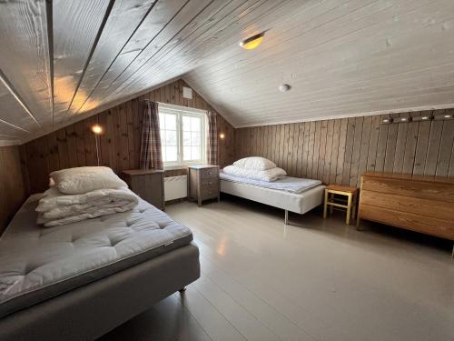 a bedroom with two beds in a attic at Granebo - Ustaoset in Ustaoset