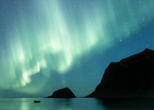 an image of the northern lights in the sky at Cabin in Lofoten with spectacular view in Ballstad