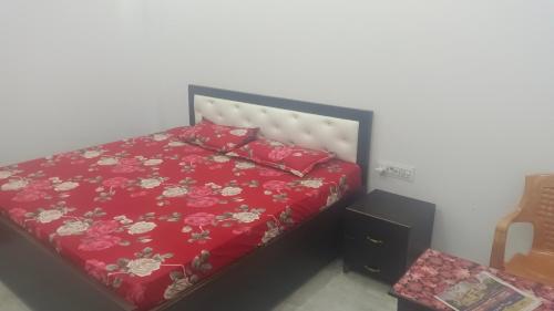 Krevet ili kreveti u jedinici u okviru objekta Hotel Harihar Atithi Bhawan