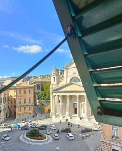 a view of a city with cars on a street at Hotel Helvetia in Genova