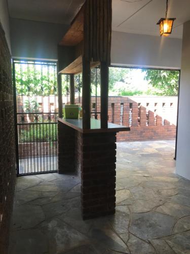 a bar in the middle of a building at 15 On Reitz Bela bela in Bela-Bela