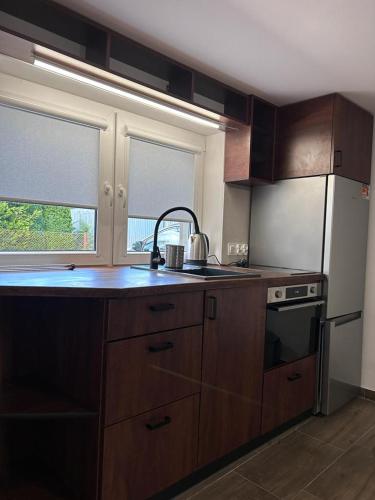 Una cocina o zona de cocina en Economy Apartment - Ustrzycka Rzeszów