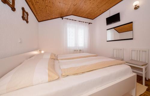 Кровать или кровати в номере B&B Apartments & Rooms Vidas