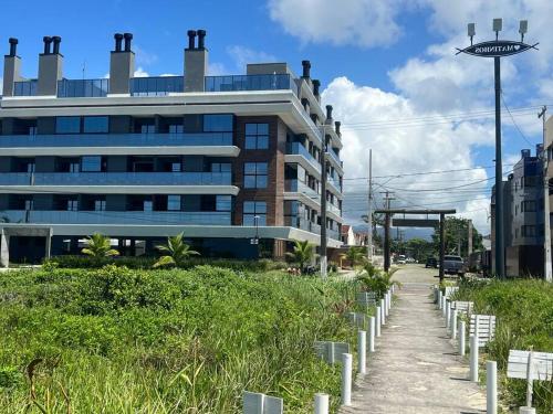 Taman di luar Studio 106 Pé na Areia Smart Costa Azul! Matinhos