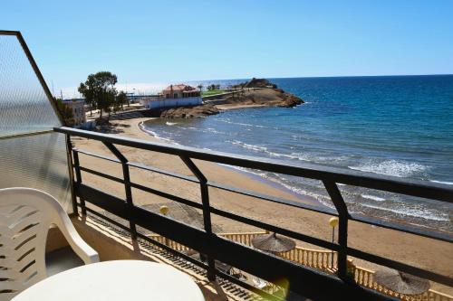 a balcony with a view of the beach at Bahía - 30º hotels in Puerto de Mazarrón