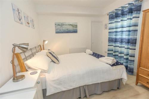 Ліжко або ліжка в номері Sandcastles, Barmouth