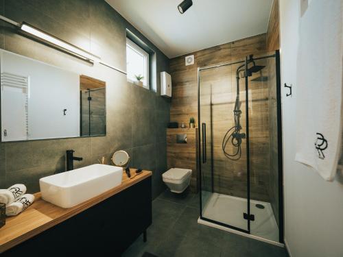 Ванна кімната в Rydzewo Resort